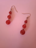 boucle d'oreille femme boule rouge acier