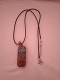 collier femme cordon noir acier pendentif floral méditerranée