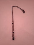 chaine femme noir chic moderne pendentif noir