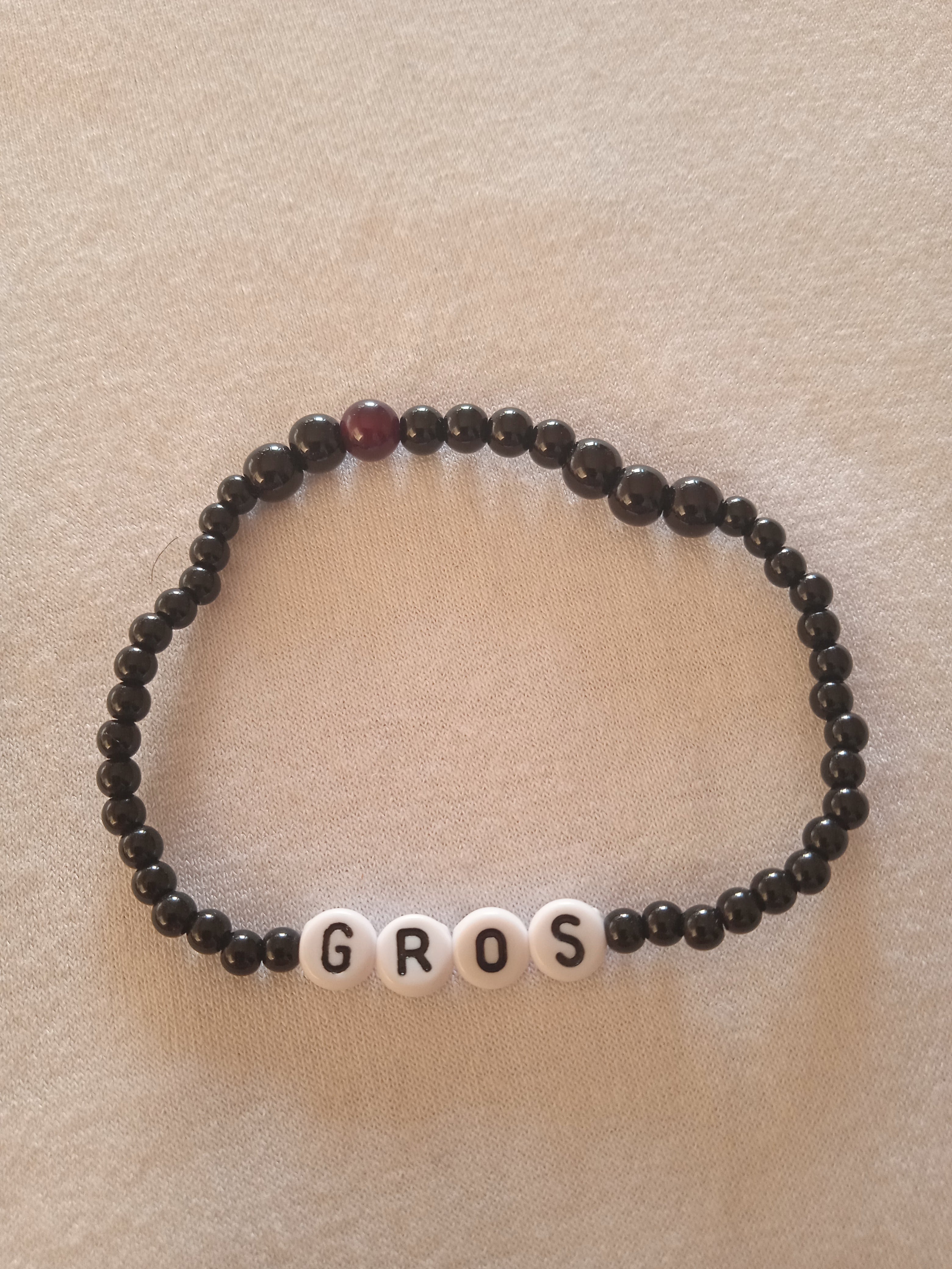 bracelet message "Gros" faot main