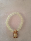 bracelet femme montres soleil vert jaune carré doré pierre blanc