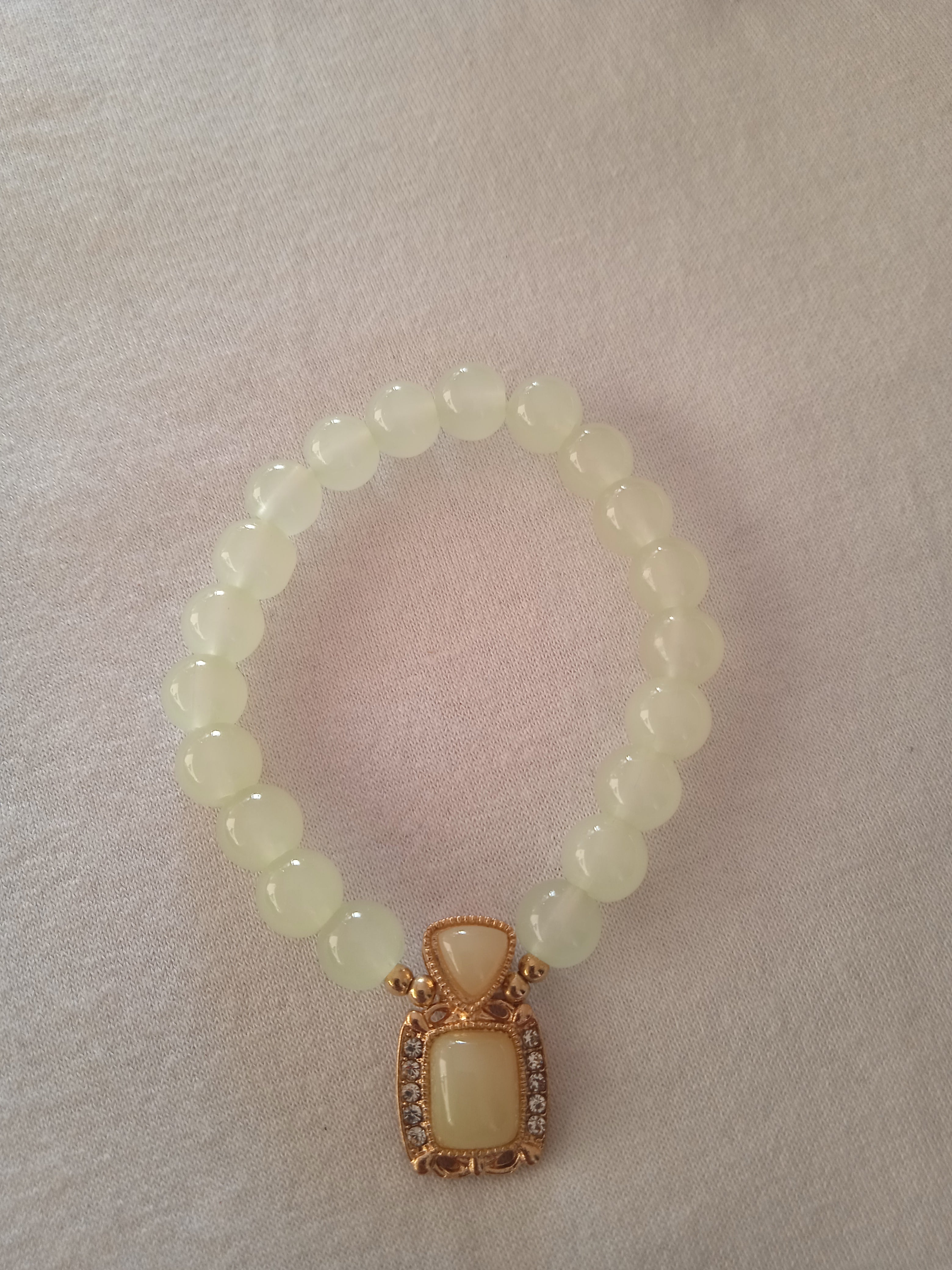 bracelet femme montres soleil vert jaune carré doré pierre blanc