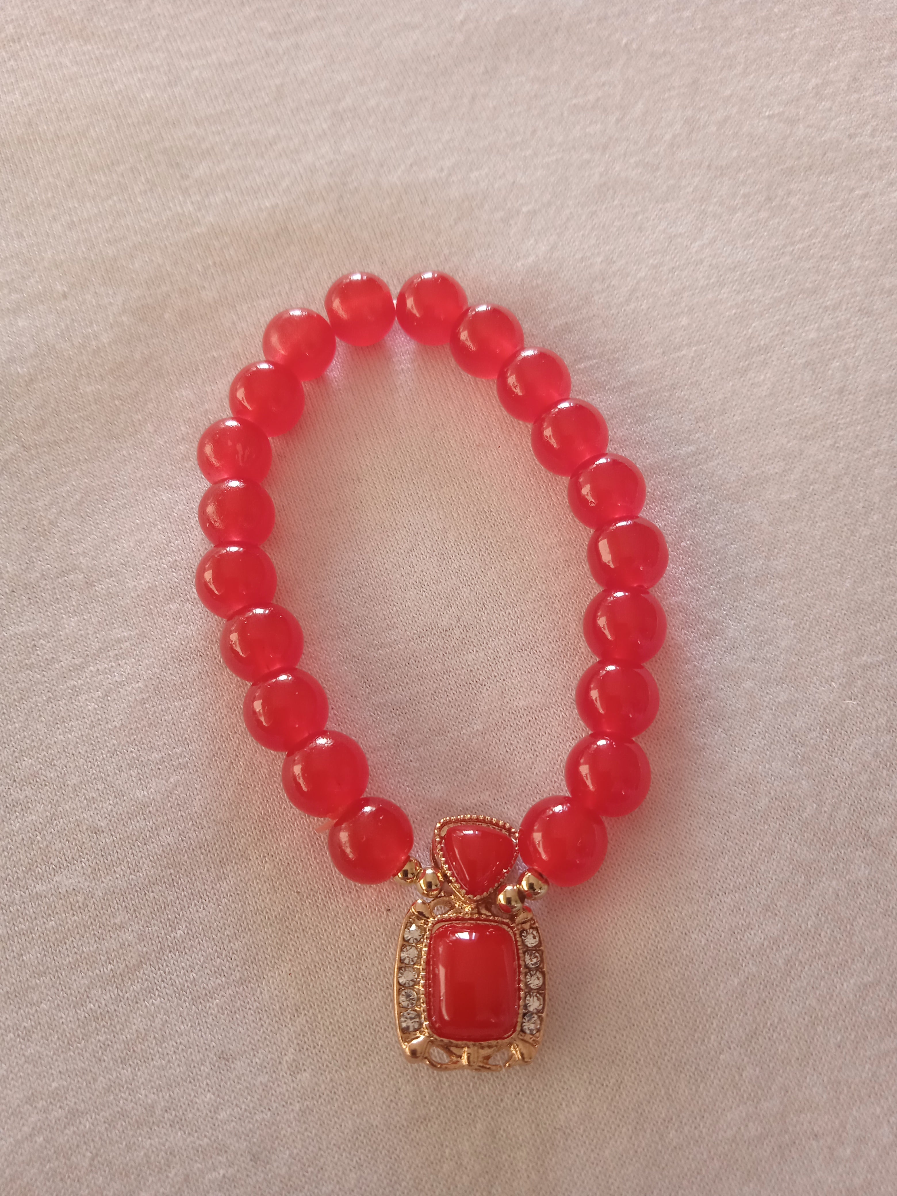 bracelet femme montres soleil rouge carré pierre banc acier doré