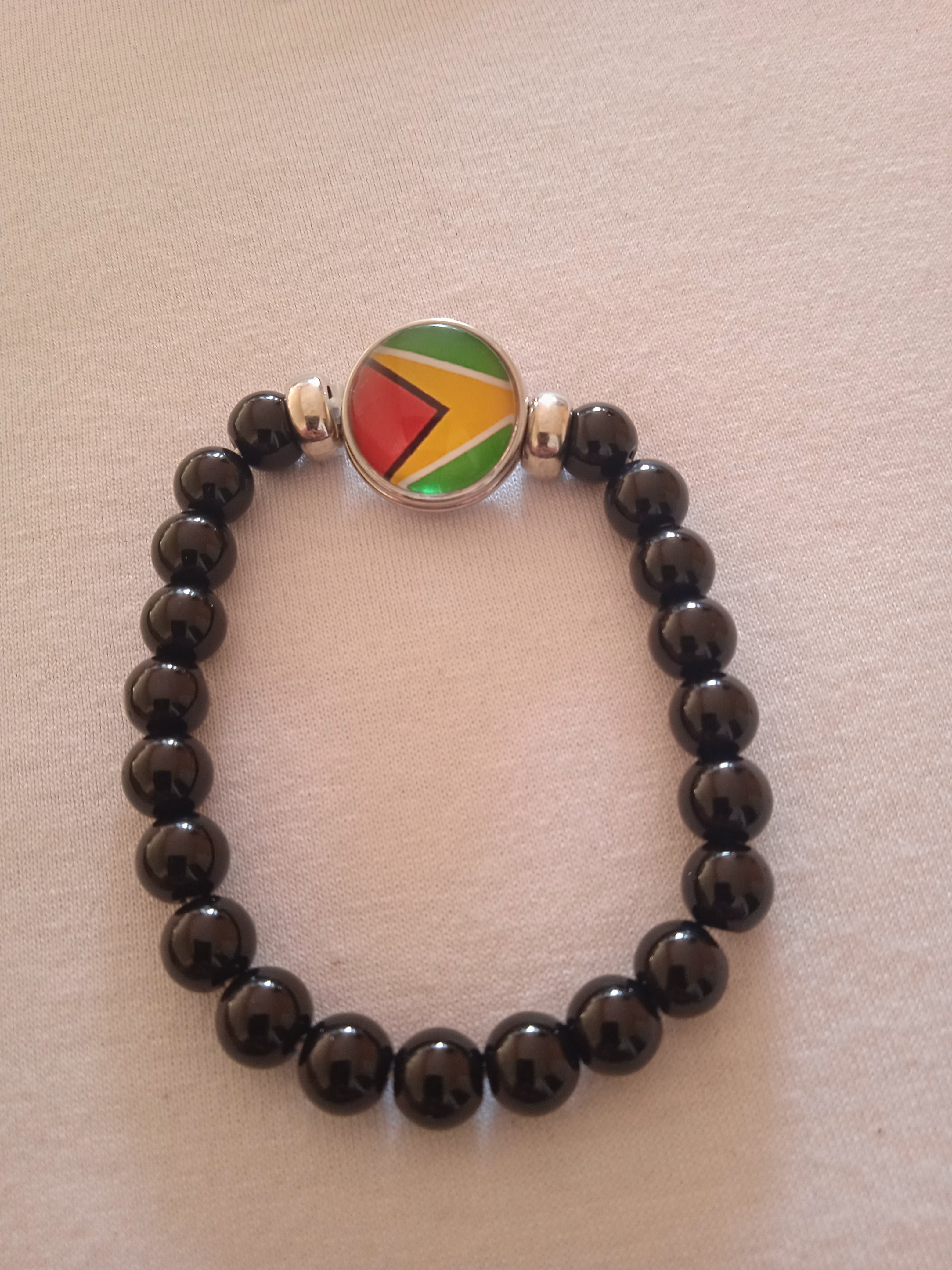 bracelet mixte jamaïcain breloque noir acier