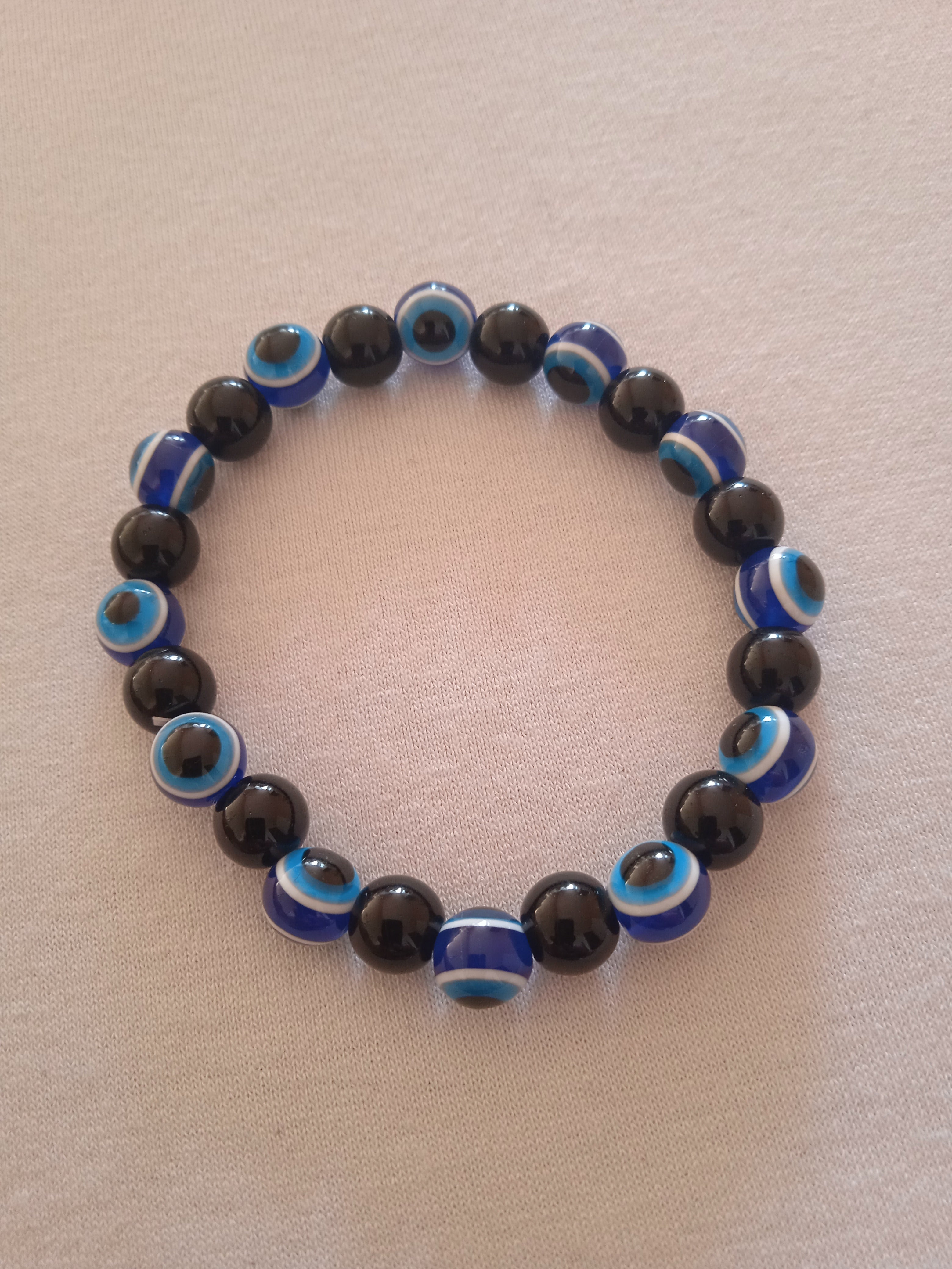 bracelet mixte oeil de chat protection