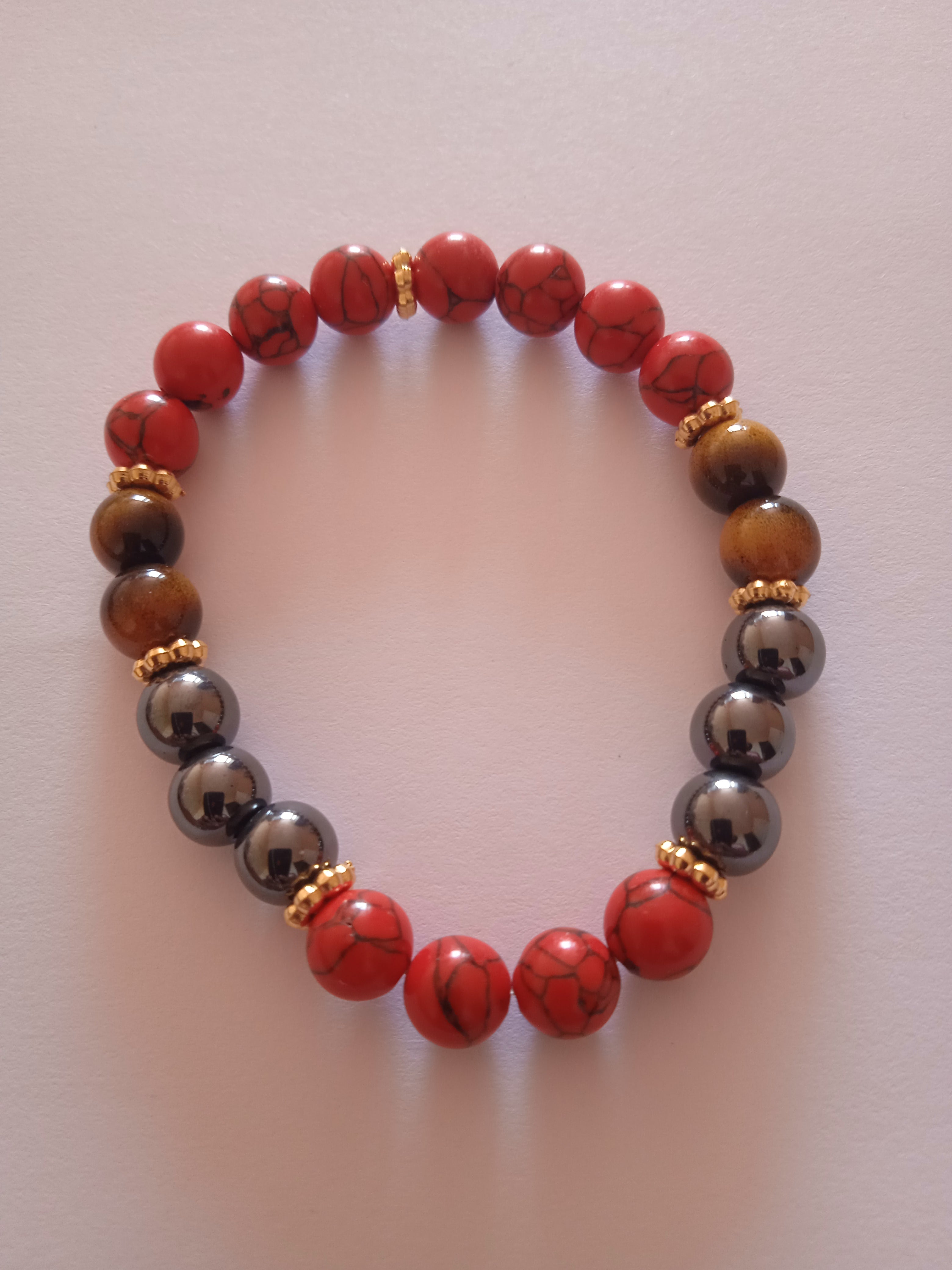 bracelet femme oeil de tigre protection acier doré