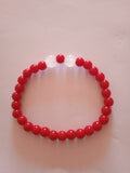 bracelet perles blanc & rouge oeil de tigre 32.90protection