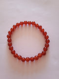 bracelet perles oeil de tigre rouge rubis