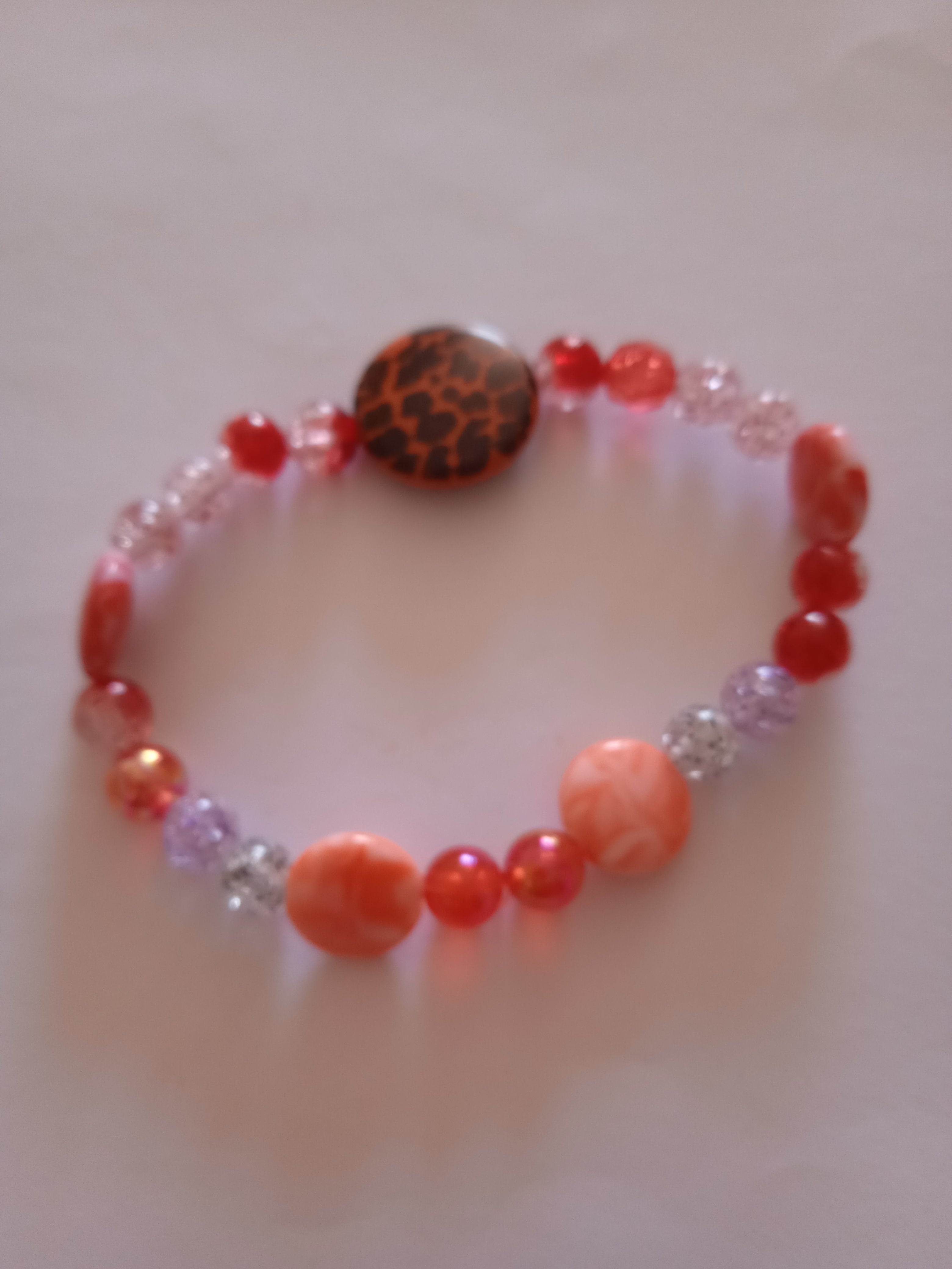 bracelet bouton léopard perles multicolores