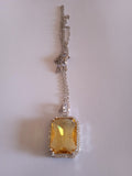 l'ensemble chaine femme pendentif jaune acier