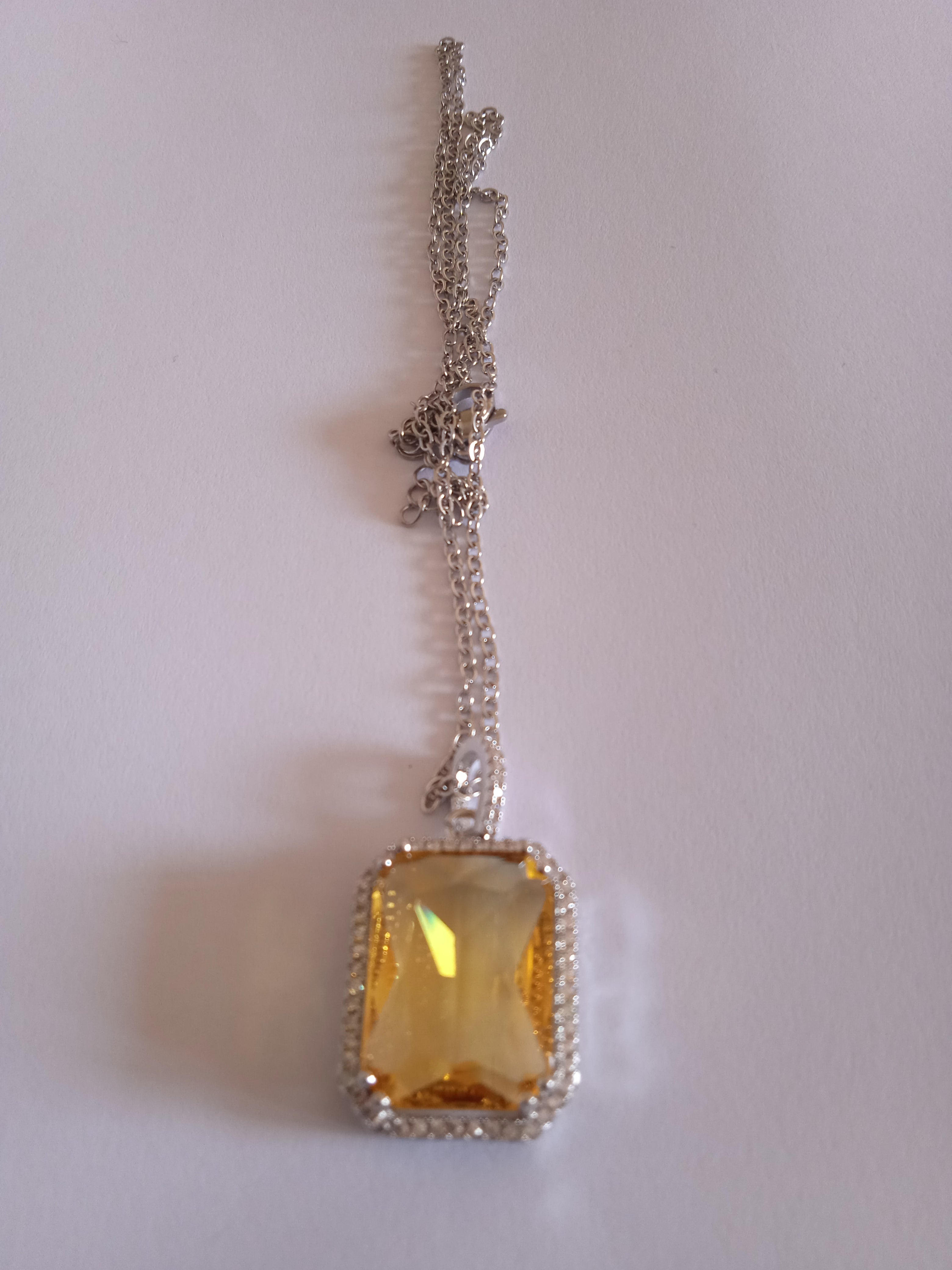 l'ensemble chaine femme pendentif jaune acier