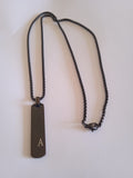 l'ensemble collier homme initial pendentif noir acier