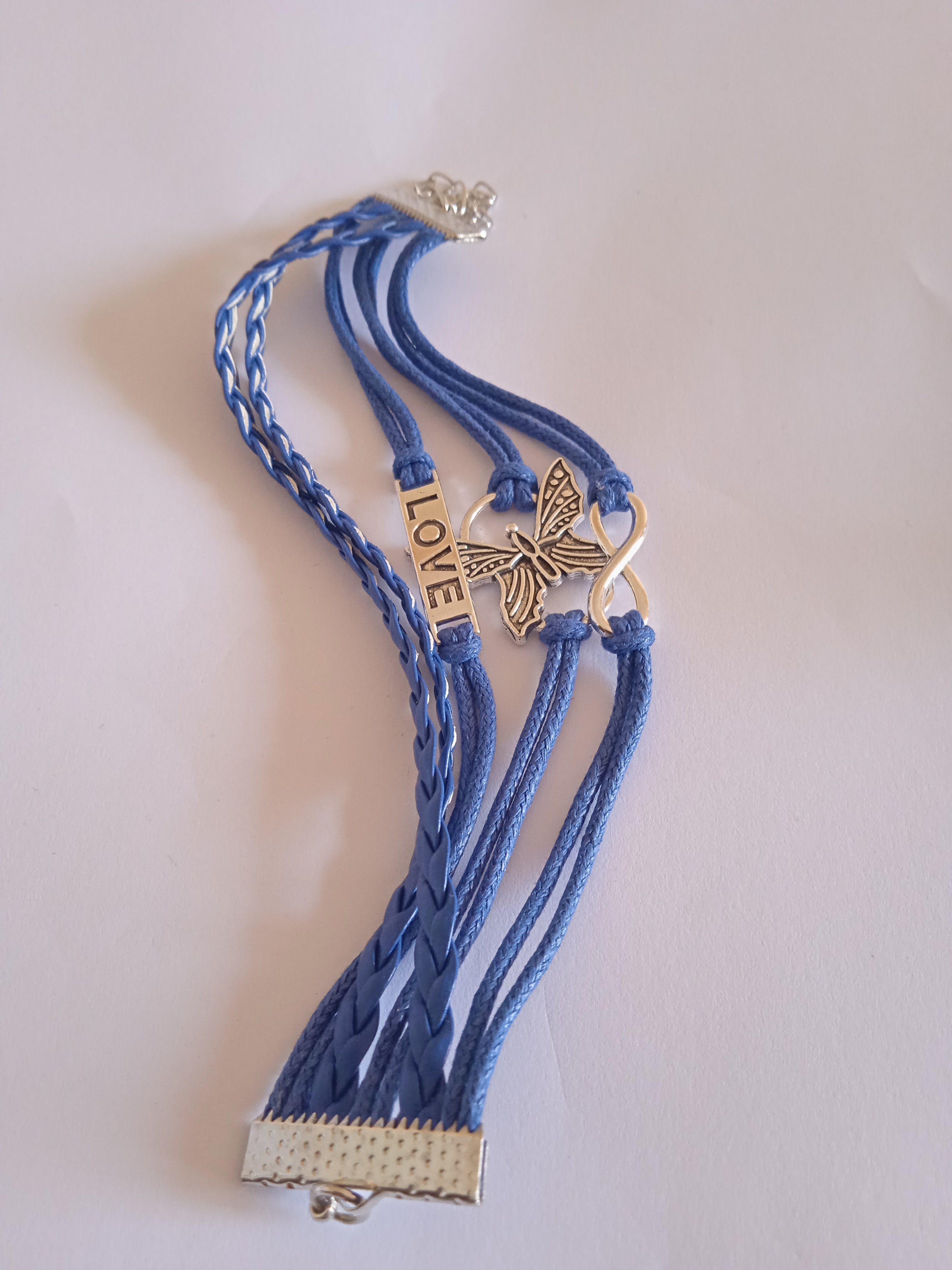 bracelet bleu blanc tressé acier papillon love