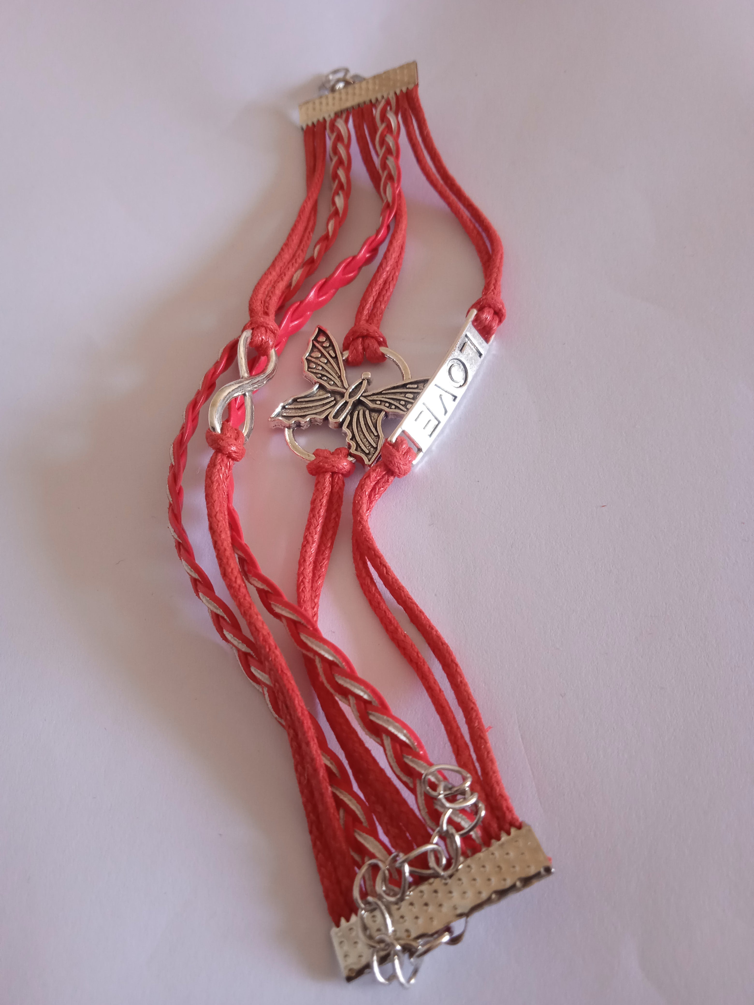 bracelet rouge tressé blanc papillon love acier