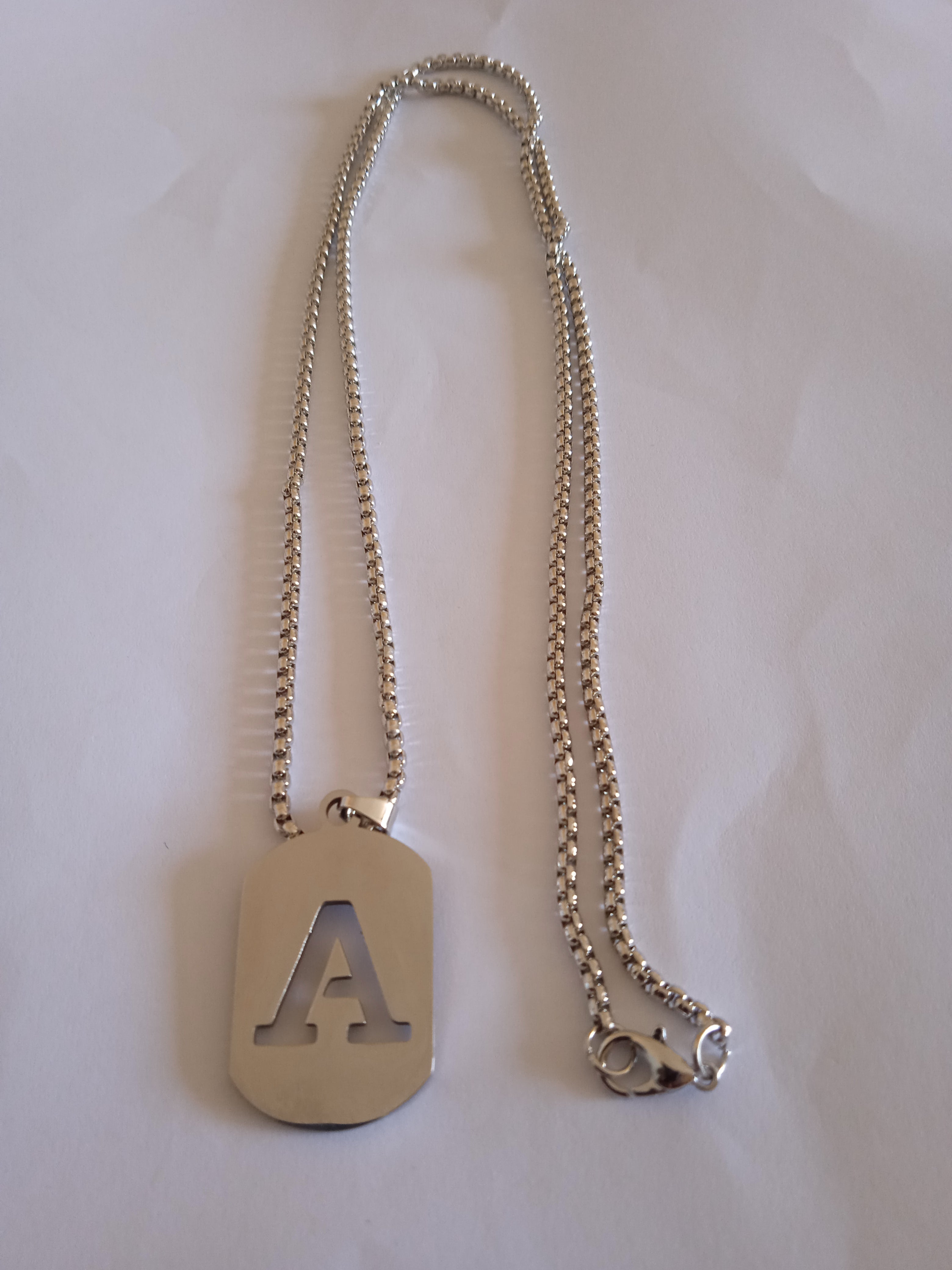 l'ensemble chaine homme initial "A" acier tressé